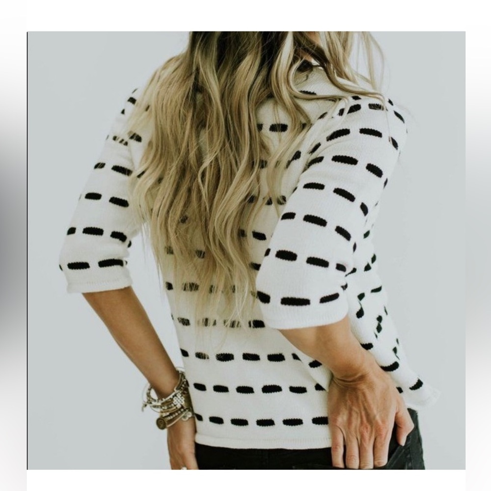 Roolee white and black sweater